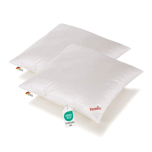 Zwei weiße Kopfkissen 80x80 geeignet für Seitenschläfer Hersteller ist Paradies
