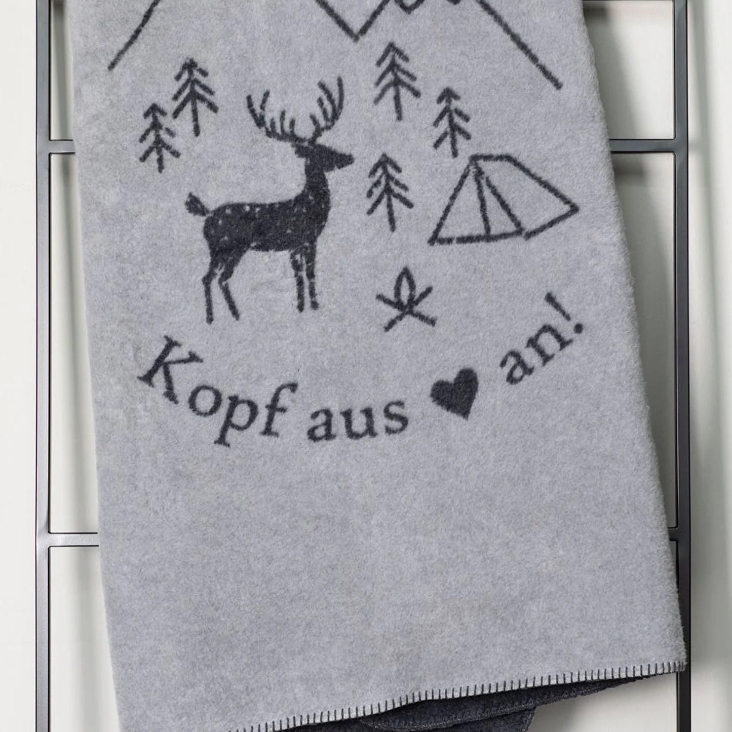 Fussenegger nachhaltige Wohndecke Kopf aus Herz an graphit 150x200
