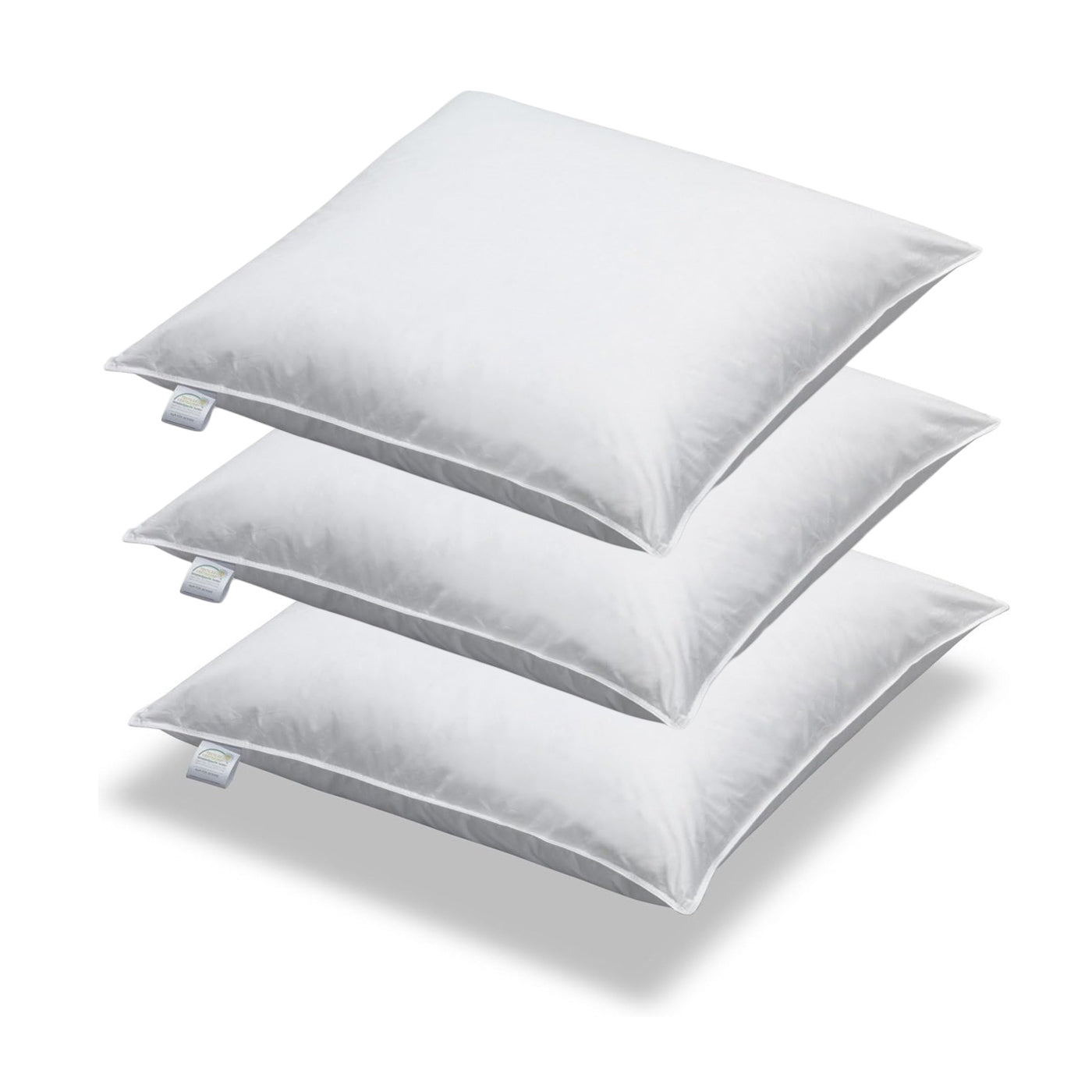 drei weiße sofakissen bzw. Couchkissen 40x40 gefüllt mit Federn der Bezug besteht aus Baumwolle